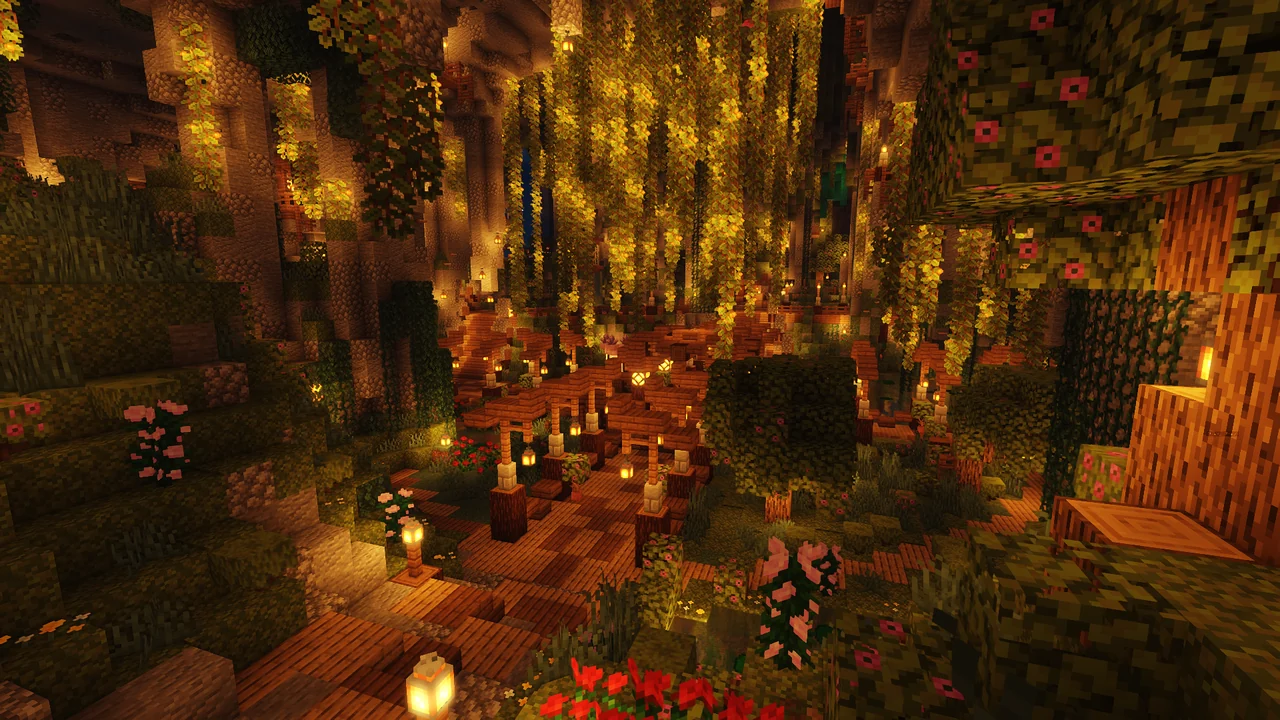 Lantern-lit walkways winding through Mineplay’s lush cavern